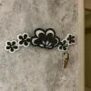 Mobili Ingresso Moderni-Selezionato da Mazzolaluce Appendichiavi moderno da parete magnetico legno traforato nero