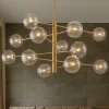 Lampadari Moderni-Ideal Lux Equinoxe sp12 ottone lampadario design bocce vetro trasparenti