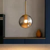 Lampade A Sospensione-Selezionato da Mazzolaluce Lampada a sospensione sfera vetro fume