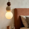 Lampade A Sospensione-Selezionato da Mazzolaluce Lampada a sospensione travertino sfera vetro per comodino