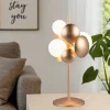 Lampade Da Tavolo-Selezionato da Mazzolaluce Lampada da tavolo design moderno oro sfere vetro bianco