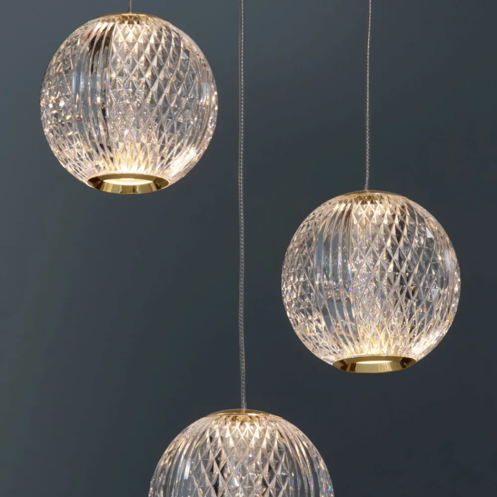 Lampadari Moderni-Selezionato da Mazzolaluce Lampadario a cascata per soggiorno 5 sfere trasparenti oro