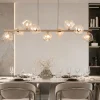 Lampadari Moderni-Selezionato da Mazzolaluce Lampadario a sospensione design moderno sabbia vetri cognac per soggiorno
