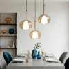 Lampadari Moderni-Fabas Luce Lampadario a sospensione tre vetri sfere ambra edolo