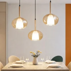 Lampadari Moderni-Fabas Luce Lampadario a sospensione tre vetri sfere ambra edolo
