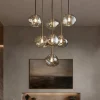 Lampadari Moderni-Selezionato da Mazzolaluce Lampadario a sospensioni in vetro cognac pendenti design moderno per soggiorno