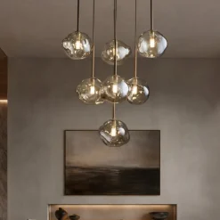 Lampadari Moderni-Selezionato da Mazzolaluce Lampadario a sospensioni in vetro cognac pendenti design moderno per soggiorno