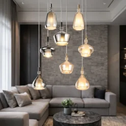 Lampadari Moderni-Selezionato da Mazzolaluce Lampadario con 8 sfere di vetro ambra cromo per soggiorno salotto