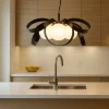 Lampadari Cucina-Selezionato da Mazzolaluce Lampadario design fiocco nero oro per cucina