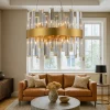 Lampadari Moderni-Selezionato da Mazzolaluce Lampadario di cristallo oro per salotto contemporaneo