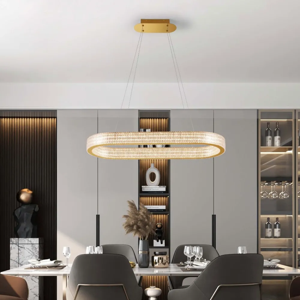 Lampadari Moderni-Selezionato da Mazzolaluce Lampadario elegante ovale oro effetto cristalli per tavolo sala da pranzo