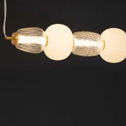 Lampadari Moderni-Selezionato da Mazzolaluce Lampadario led oro stile contemporaneo per soggiorno