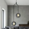 Lampadari Moderni-Selezionato da Mazzolaluce Lampadario led 20w 3000k nero bocce vetro fume