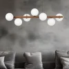 Lampadari Moderni-Selezionato da Mazzolaluce Lampadario legno noce per soggiorno moderno