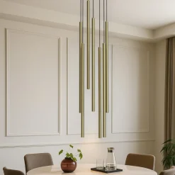Lampadari Moderni-Selezionato da Mazzolaluce Lampadario moderno a cascata 7 luci cilindri oro per soggiorno