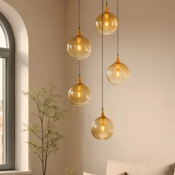 Lampadari Moderni-Selezionato da Mazzolaluce Lampadario moderno 5 luci sfera in vetro ambra led 3000k