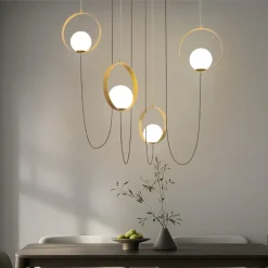 Lampadari Moderni-Selezionato da Mazzolaluce Lampadario moderno oro led 20w 3000k per soggiorno