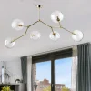 Lampadari Moderni-Selezionato da Mazzolaluce Lampadario moderno per salotto oro 6 bocce trasparenti