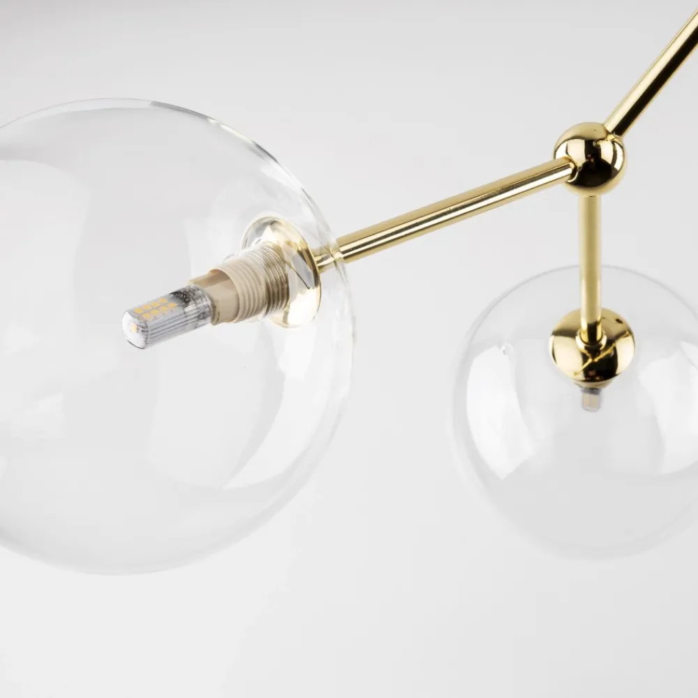 Lampadari Moderni-Selezionato da Mazzolaluce Lampadario moderno per salotto oro 6 bocce trasparenti