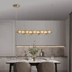 Lampadari Moderni-Selezionato da Mazzolaluce Lampadario moderno per tavolo da pranzo vetro ambra led 3000k