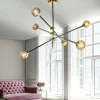 Lampadari Moderni-Selezionato da Mazzolaluce Lampadario nero oro 6 luci orientabili vetri ambra per soggiorno