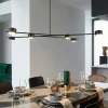 Lampadari Moderni-Selezionato da Mazzolaluce Lampadario nero oro moderno per tavolo da soggiorno