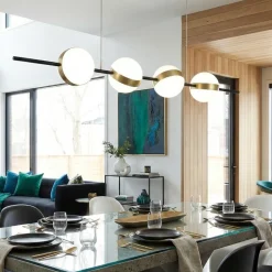 Lampadari Moderni-Selezionato da Mazzolaluce Lampadario nero oro orizzontale con sfere per soggiorno moderno