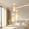 Lampadario Camera Da Letto-Selezionato da Mazzolaluce Lampadario oro con capsule pendenti in vetro ambra per camera da letto moderna