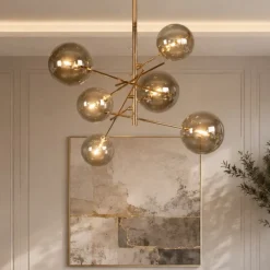 Lampadari Moderni-Selezionato da Mazzolaluce Lampadario oro sfere di vetro fume moderno per soggiorno