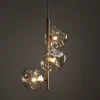 Lampadari Moderni-Selezionato da Mazzolaluce Lampadario per camera da letto verticale design moderno vetri cognac
