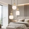 Lampadario Camera Da Letto-Selezionato da Mazzolaluce lampadario per camera da letto stile contemporaneo 3 vetri pendenti bianco ambra