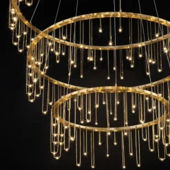 Lampadari Moderni-Selezionato da Mazzolaluce Lampadario per salone stelle cadenti oro ramato moderno led 72w 3000k