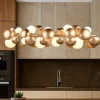 Lampadari Cucina-Selezionato da Mazzolaluce Lampadario per tavolo cucina moderna oro sfere vetro bianco