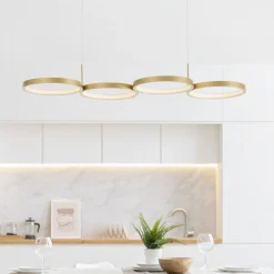 Lampadari Moderni-Selezionato da Mazzolaluce Lampadario per tavolo da pranzo anelli oro led 3000k design