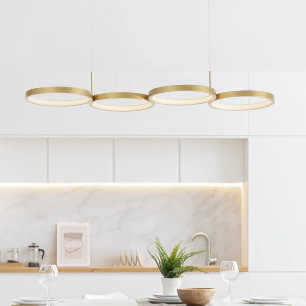 Lampadari Moderni-Selezionato da Mazzolaluce Lampadario per tavolo da pranzo anelli oro led 3000k design