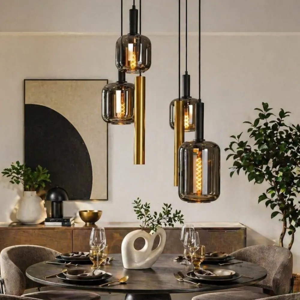 Lampadari Moderni-Selezionato da Mazzolaluce Lampadario sfere vetro e cilindri oro a sospensione per soggiorno