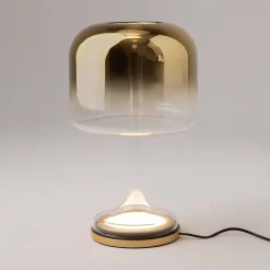 Lampade Da Tavolo-Maytoni spirito lampada da tavolo per salone vetro fume' oro led 18w 3000k dimmerabile