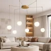 Lampadari Moderni-Ondaluce santos lampadario con sopensioni decentrate 6 luci vetri bianchi led 3000k