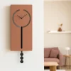 Orologi Da Parete Moderni-Selezionato da Mazzolaluce Orologio a pendolo moderno da parete mousse e nero