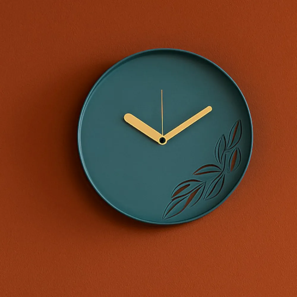 Orologi Da Parete Moderni-Selezionato da Mazzolaluce Orologio da muro moderno rotondo color petrolio con foglie