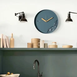Orologi Da Parete Moderni-Selezionato da Mazzolaluce Orologio da muro moderno rotondo color petrolio con foglie