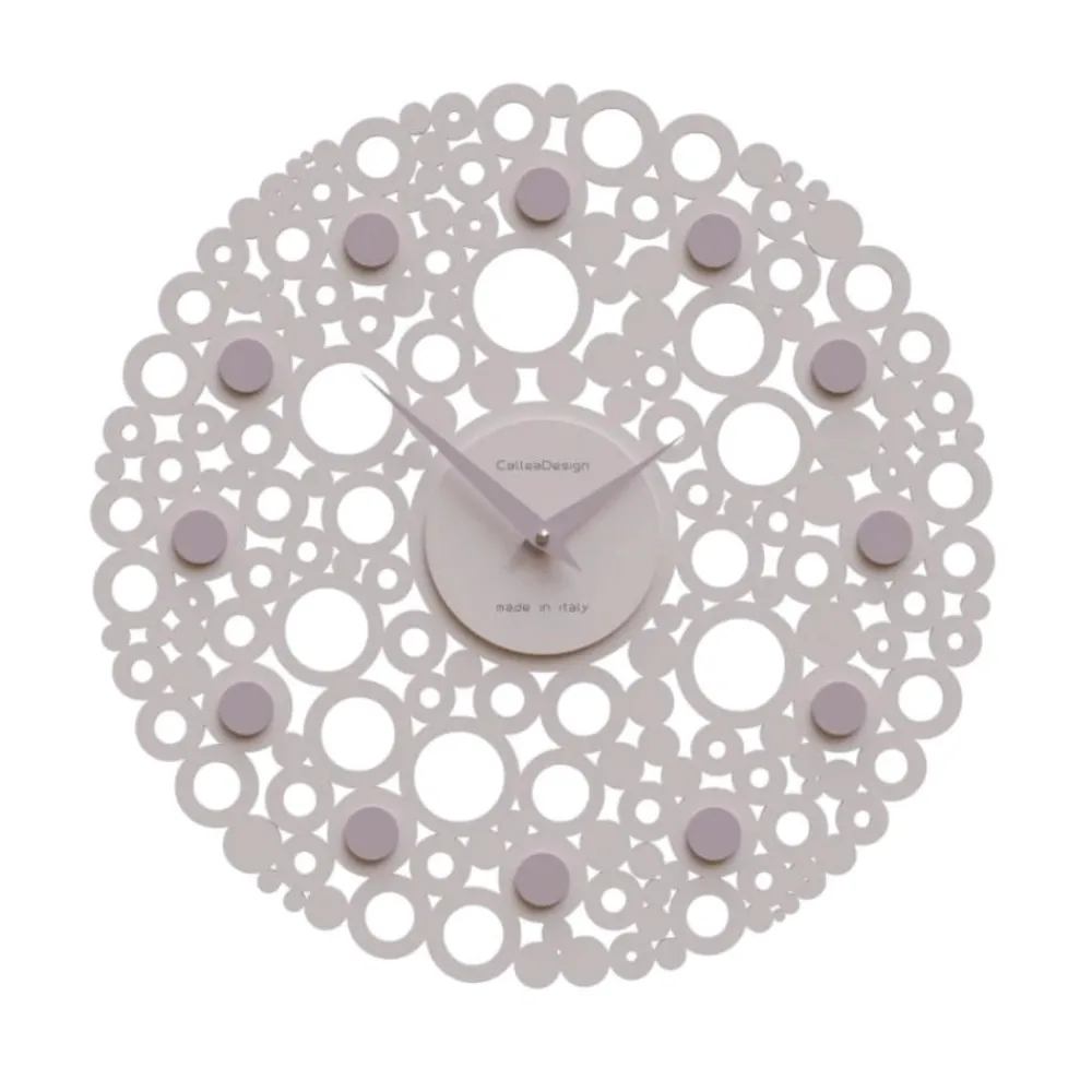 Orologi Da Parete Moderni-Selezionato da Mazzolaluce Orologio da parete legno rosa traforato rotondo