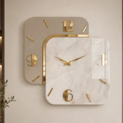 Orologi Da Parete Moderni-Selezionato da Mazzolaluce Orologio da parete moderno in resina effetto marmo dettagli foglia oro