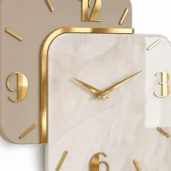 Orologi Da Parete Moderni-Selezionato da Mazzolaluce Orologio da parete moderno in resina effetto marmo dettagli foglia oro