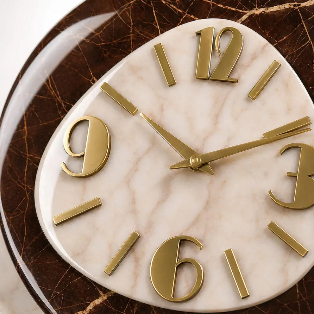 Orologi Da Parete Moderni-Selezionato da Mazzolaluce Orologio in resina da parete effetto marmo dettagli foglia oro