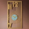 Orologi Da Parete Moderni-Selezionato da Mazzolaluce Orologio moderno verticale da muro oro e verde marino