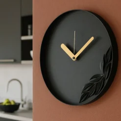 Orologi Da Parete Moderni-Selezionato da Mazzolaluce Orologio nero da parete design rotondo con foglie