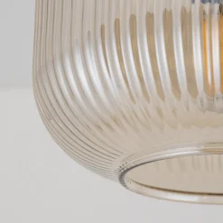 Plafoniere Moderne-Selezionato da Mazzolaluce Piccola plafoniera da soffitto sfera di vetro rigato cognac trasparente
