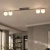 Plafoniere Moderne-Selezionato da Mazzolaluce Plafoniera a binario 141 cm marrone con sfere di vetro per soggiorno moderno