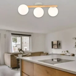 Plafoniere Moderne-Selezionato da Mazzolaluce Plafoniera di legno naturale per cucina